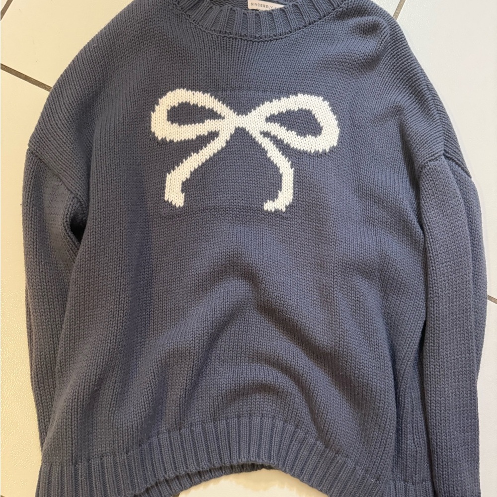 Cozy Blue Sweater with White Bow